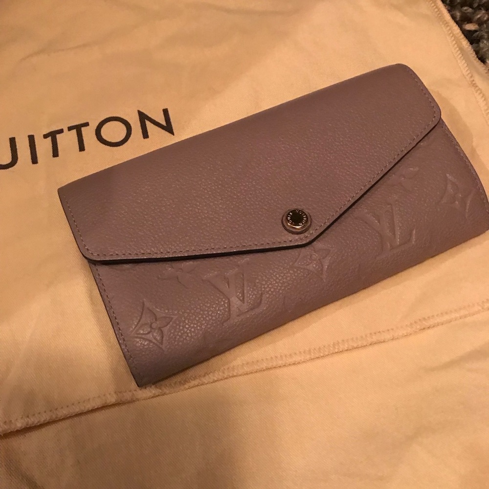 Louis Vuitton Spontini wallet in taupe